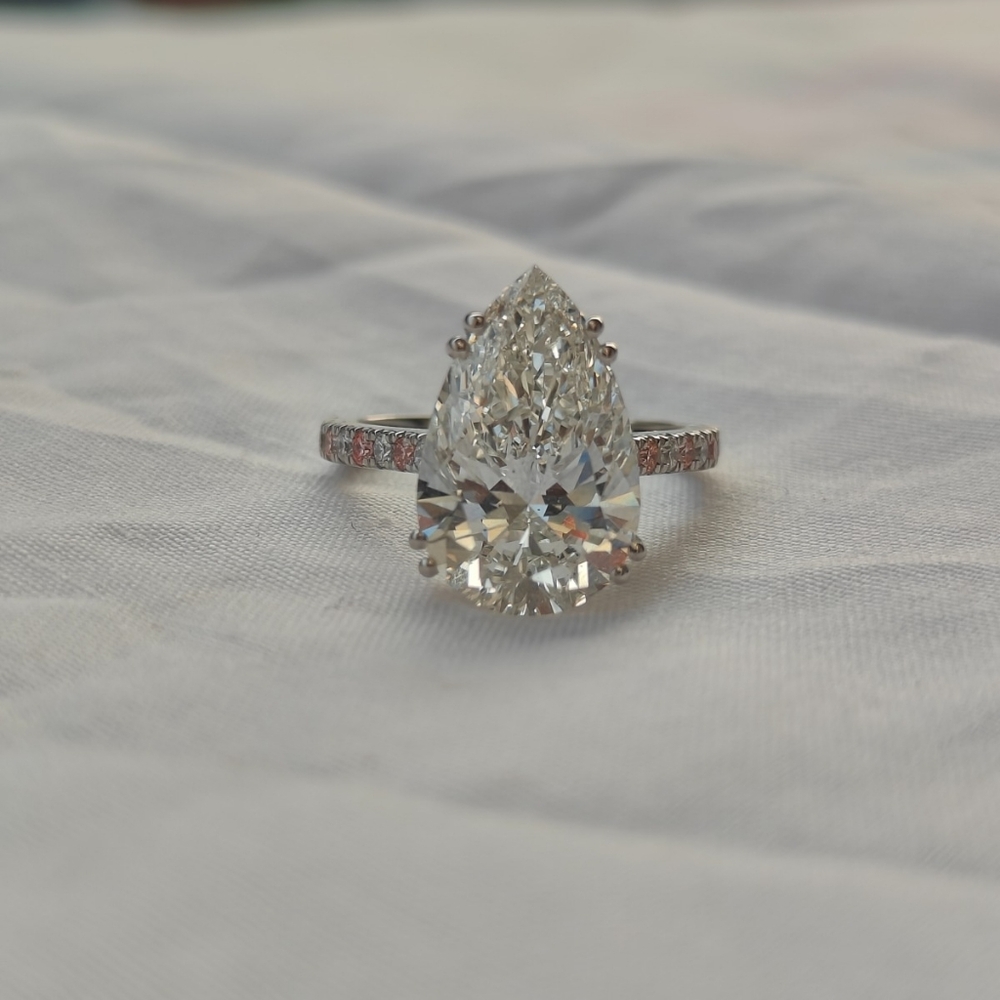 6.5 Carat IGI Pear Cut Platinum Diamond Ring!
